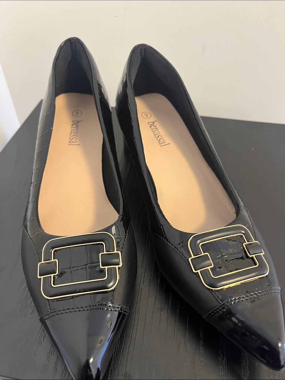 Benassal Black Pointed Toe Flats with Gold Buckle Detail